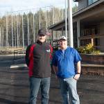Charles Heitman, left, and Gary Haven stand on the newly paved path at the Federal Way National Little League complex. The path now allows those who use wheelchairs and other mobility devices to easily access all areas of the complex. Olivia Sullivan/staff photo