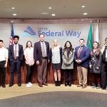 Left to right: Mayor Jim Ferrell, council member Hoang Tran, Marcel Manjares, council member Jesse Johnson, Hope Sichel, council member Mark Koppang, Chloe Barrier, Brigitte Jimenez, council member Martin Moore, Hannah Santiago, council member Lydia Assefa-Dawson, Katie Astruon, Deputy Mayor Susan Honda and council member Dini Duclos. Photo courtesy of city of Federal Way