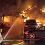 Man jumps from window of burning home after attempting to save dogs