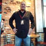 Jim Myers, the assistant to the general manager at The Rock Wood Fired Pizza, stands in the bar area of the restaurant. Myers was named the Mirrors Citizen of the Month for February after staying late at the restaurant to help feed the homeless during the recent snowstorm. Carrie Rodriguez/staff photo