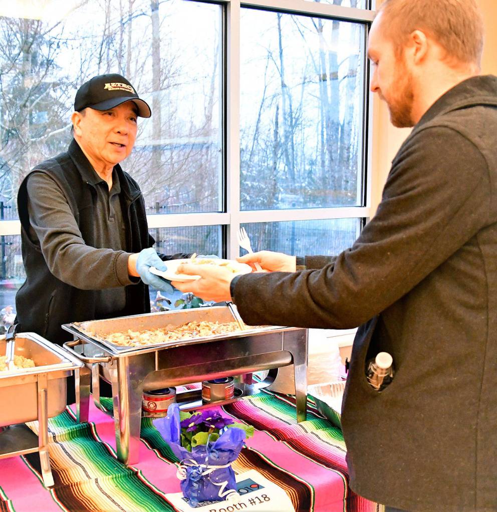 Attendees enjoy Mexican cuisine from Azteca. Photo courtesy of Bruce Honda
