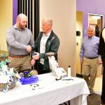 Attendees mingle and check out more than 20 vendors during the event. Photo courtesy of Bruce Honda