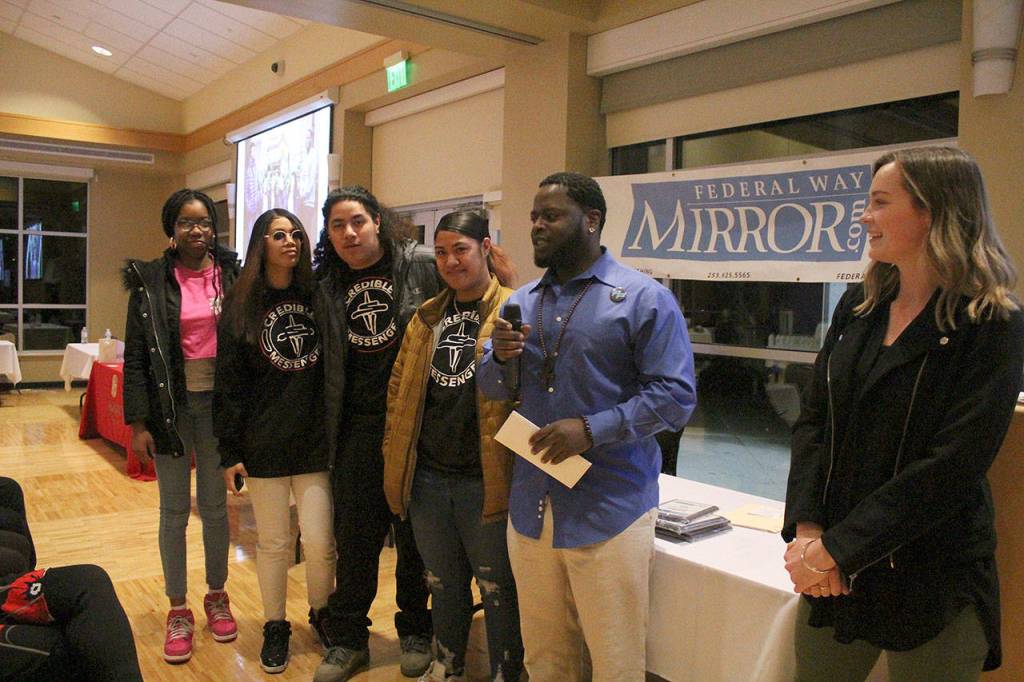Eddie Howard (second from right), who leads the Credible Messengers program in Federal Way, won Story of the Year for his work with at-risk youth.