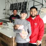 Big Island Poke owner Jaydean Gabriel, front right, stands with his wife Mickey, front left, and employee Sim Muna, back. Olivia Sullivan/staff photo
