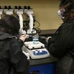 Students in the new biomedical program at Decatur High School use advanced lab equipment in class. Olivia Sullivan/staff photo