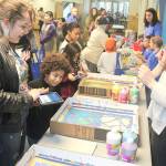 Students check out an art in STEM exhibit during the third annual STEM Exploration Night on March 27 at Federal Way High School. Photo courtesy of Federal Way Public Schools