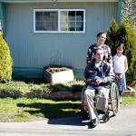 The Barco family returns to their Des Moines home for the first time since Bernardo, front, lost his left leg and right arm in a motorcycle crash in December 2018. Haley Donwerth/staff photo