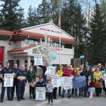 Supporters and community members gather at fire Station 64 to greet the runners at the finish line. Olivia Sullivan/staff photo