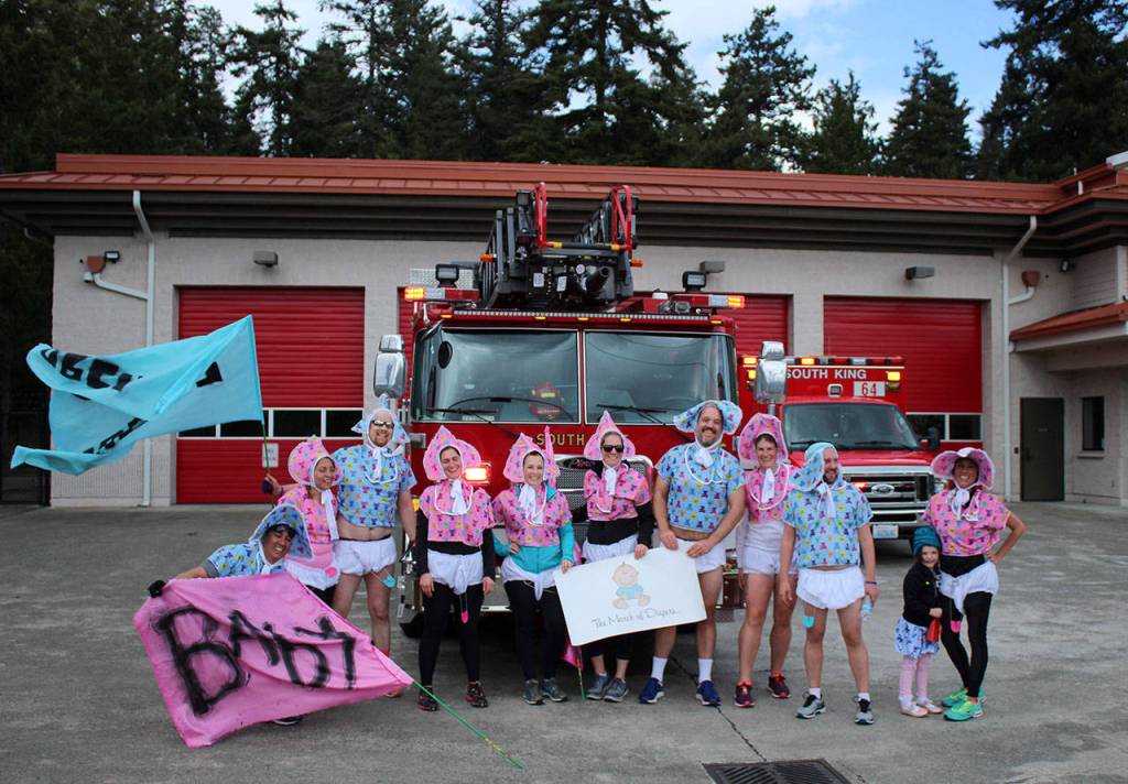 This year, 10 runners donned diapers and ran from Hoyt Road to South 320th Street for March of Diapers. Olivia Sullivan/staff photo