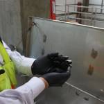 Jim Pitts, King County system analyst holds a handful of Loop, a powerful fertilizer derived from wastewater which the county sells to commercial buyers. The carbon-rich product offsets the carbon expended in operating the plant. Aaron Kunkler/staff photo