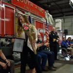 Kaitlyn Benson after receiving her award from SKFR for her heroic actions and a bouquet of roses from the Barco Family. Haley Donwerth/staff photo