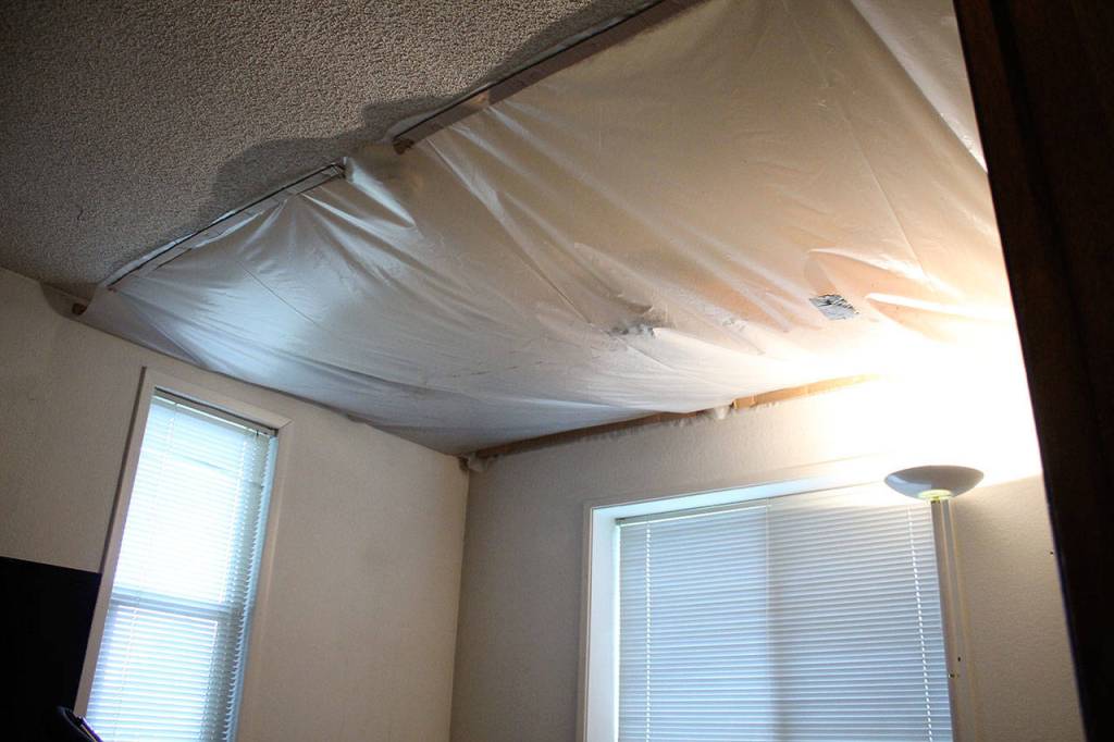A room inside the Vaughns house has only a tarp as a cover due to their damaged roof. Olivia Sullivan/staff photo