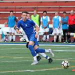 Federal Ways Zane Baumgardt, center, is the NPSL Olympic Division boys soccer MVP. Olivia Sullivan/staff photo