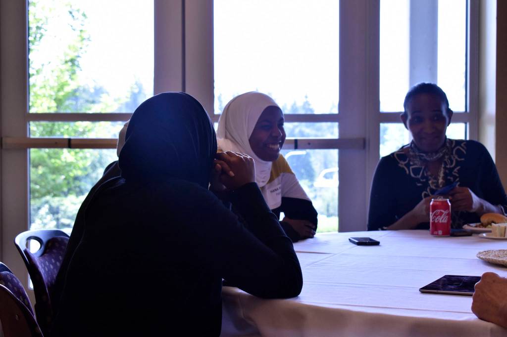 Students at the Federal Way Rotary Scholarship Luncheon sharing a laugh before the award ceremony. Haley Donwerth /staff photo.