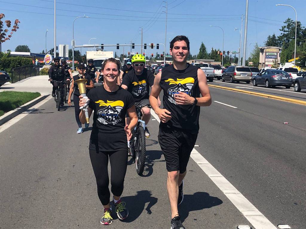 FWPD having fun carrying the torch for the annual Special Olympics Torch Run May 31. Photo courtesy of FWPD