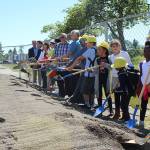 FWPS district, city, and school board officials break ground at Mirror Lake Elementary with the help of some scholars on Tuesday, June 11. Olivia Sullivan/staff photo