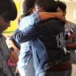 Rochelle Wilson, right, and Alexis Broussard embrace at Cameron Wilsons healing circle. Both mothers have lost a son to gun violence in the last six months. Olivia Sullivan/staff photo