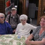 From left: Del Carlino, Don Amundson, Lee Mackenzie, and Lynda Amundson meet for lunch every Tuesday at the Federal Way Senior Center. Olivia Sullivan/staff photo