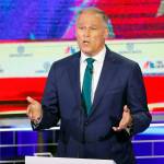 Democratic presidential candidate and Washington Gov. Jay Inslee speaks during a primary debate hosted by NBC News in Miami on Wednesday. (AP Photo/Wilfredo Lee)