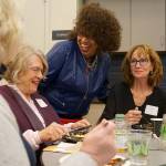 Dr. Natalie Ellington, second from right in blue, chats with guests at the 4th annual Eileen & Callies Place Benefit Breakfast. The event raised more than $16,000 for the non-profit. Photo courtesy of Jason Hodge, TJH Media