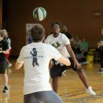 Donte Peoples practices passing drills at the StormCares clinic on July 8. Olivia Sullivan/staff photo