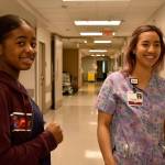 Favour Ayemere (left) and Elizabeth Dangley (right) going through Dangleys rounds as a nurse in the medical surgery ward. Haley Donwerth /staff photo.