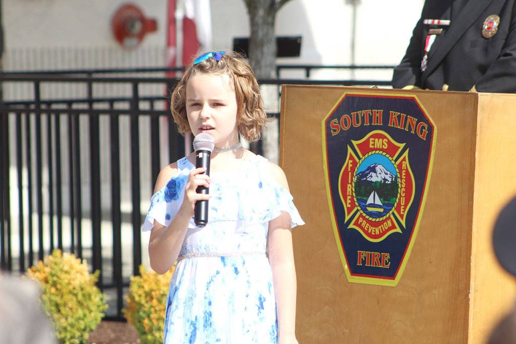 Sarah Goodin, 8 years old, performs Amazing Grace, during the Sept. 11 event. Olivia Sullivan/staff photo