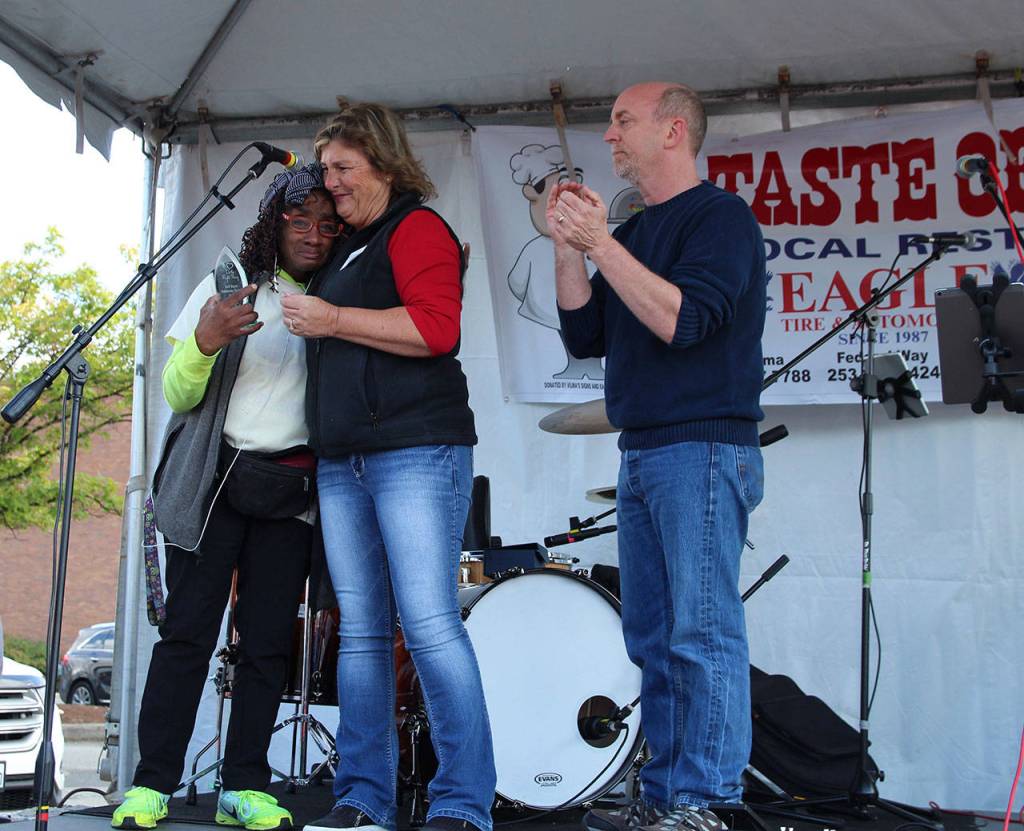 Betty Taylor bursts into tears as she is presented with the Dick Mayer Community Award.