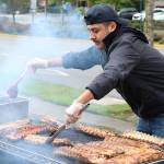 A Jimmy Macs Roadhouse cook prepares the restaurants sampler dish for the Taste of Federal Way.