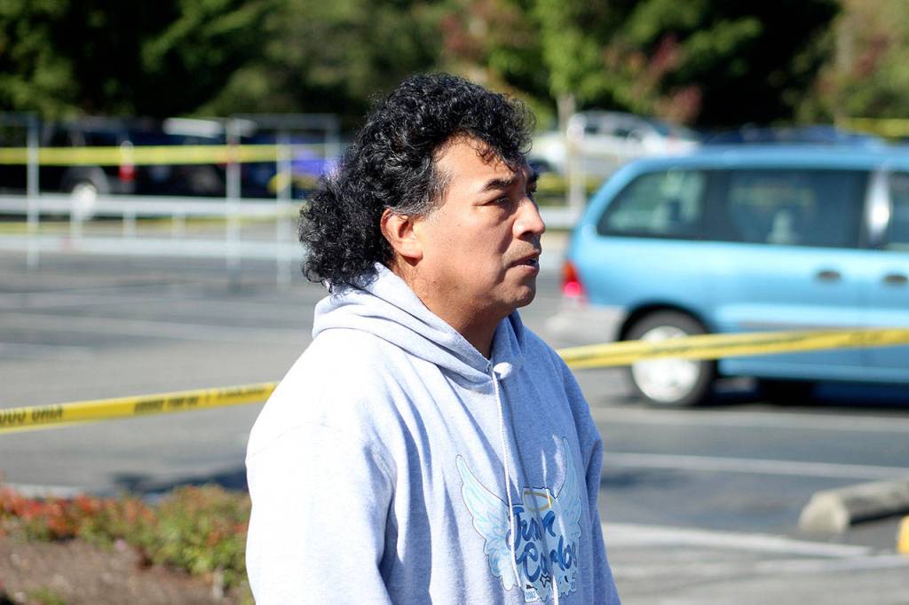 Juan Carlos Con, father of Juan Carlos Con Guzman, pictured on scene in Federal Way at the arrest of a 28-year-old man suspected to have murdered his son last month. Olivia Sullivan/staff photo