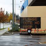 A solar traffic message board outside of a business on Pacific Highway urges Federal Way citizens to Please vote no prop 1. Olivia Sullivan/staff photo