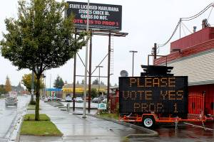 ‘Fighting fire with fire’: Prop 1 controversy heats up as marijuana retailer proponents also put up illegal sign