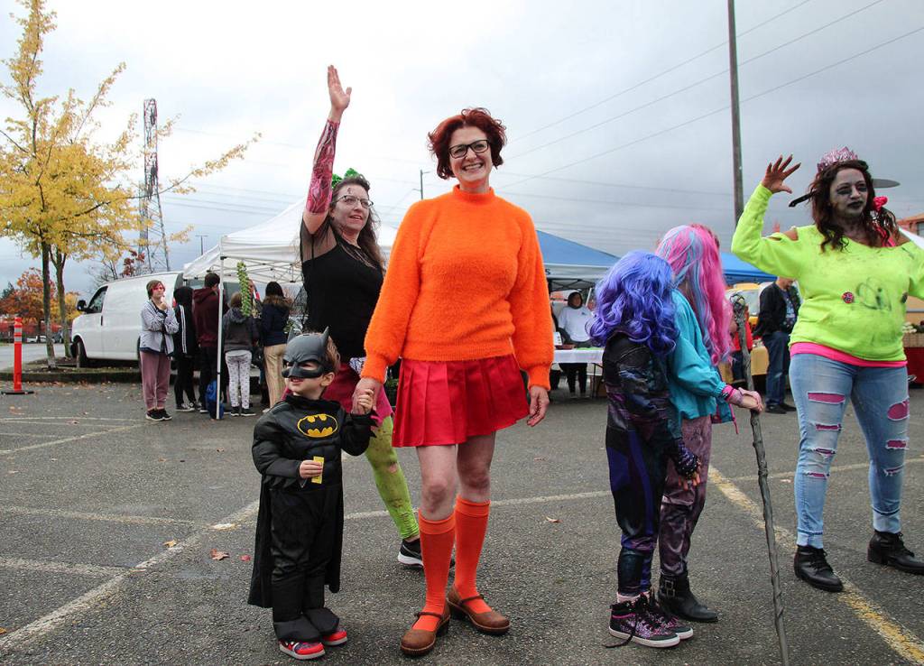 Batman and Velma from Scooby Doo made an appearance at the Federal Way Farmers Market on Saturday, Oct. 26. Olivia Sullivan/staff photo