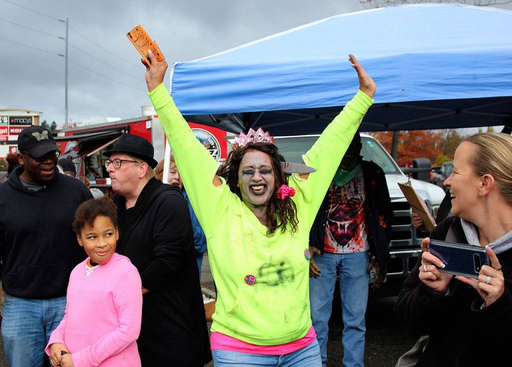 Winners of the Federal Way Farmers Market costume contest won gift certificates to restaurants such as JPs Taproom, free mini doughnuts and more on Saturday, Oct. 26. Olivia Sullivan/staff photo