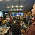 Dozens of supporters and Federal Way community members gather at Scoreboard in Federal Way awaiting initial election results. Haley Donwerth/staff photo