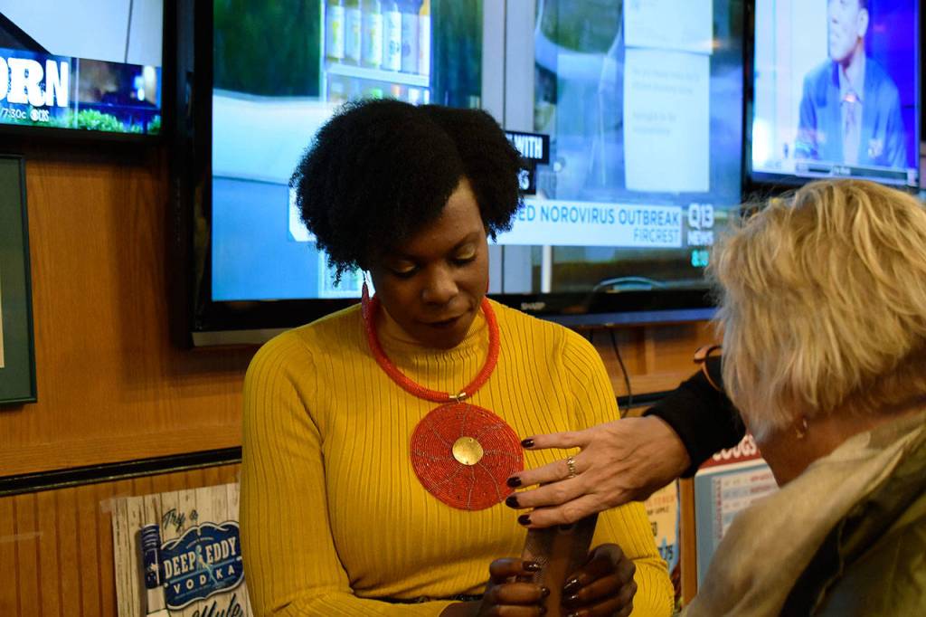 Council hopeful Jamila Taylor checks results with 30th District Sen. Claire Wilson. Currently Taylor is losing to incumbent Mark Koppang. Haley Donwerth/staff photo