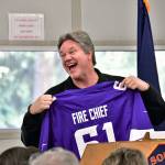 South King Fire and Rescue fire chief Dr. Allen Church beams as he holds up a personalized Minnesota Vikings jersey, gifted to him from his department administration team, at Churchs retirement party on Nov. 8. Photo courtesy of Bruce Honda
