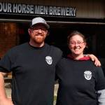 Dane Scarimbolo and Dominique Torgerson, shown in this October 2019 file photo, run Four Horsemen Brewery in Kent. They were almost shut down in late 2017 by King County, which after years of letting them operate a brewery and taproom, decided they were in violation of county code. (Aaron Kunkler/Sound Publishing)