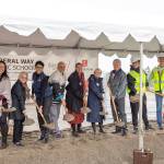 Left to right: TJHS principal Adrienne Chacon, Sen. Claire Wilson, Superintendent Dr. Tammy Campbell, school board President Geoffery McAnalloy, school board member Dr. Jennifer Jones, former principal Liz Drake, school board member Hiroshi Eto, and Thomas Jefferson scholars break ground at the ceremony on Tuesday. Photo courtesy of Federal Way Public Schools