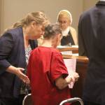 Beverly Lorraine Jenne, 85, reads a document during her arraignment on Tuesday, when she pleaded not guilty to pre-meditated murder in the first degree in the killing of her 37-year-old roommate in December. Olivia Sullivan/staff photo