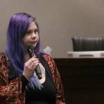 Chelsea Olsen, 27, answers questions from the crowd about her experience as a sex trafficking survivor at the Federal Way Coalition Against Trafficking forum on Jan. 16. Olivia Sullivan/staff photo