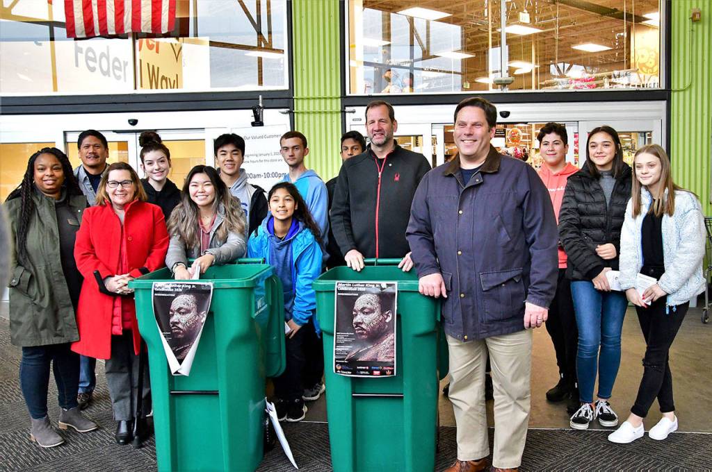 Federal Way Mayor Jim Ferrell (front, right), Deputy Mayor Susan Honda (front, left), council member Mark Koppang (front, second from right) and community members gather for a photo during a food drive on Saturday in honor of Martin Luther King, Jr. Photo courtesy of Bruce Honda