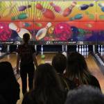 A Thomas Jefferson bowler and onlooking crowd watch the lane as a ball rolls toward the last pin standing at the North Puget Sound League tournament at Secoma Lanes on Jan. 22. Olivia Sullivan/staff photo