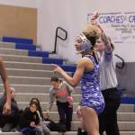 Federal Way 130-pound junior London Houston, last years wrestling state champion, wins her match against TJs Octavia Johnson at the All-City meet on Jan. 23. Olivia Sullivan/staff photo