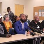 L-R: Maliks step-father Marvin Phelps; Not This Time founder Andre Taylor; Maliks father Marvin Donell Walker Sr.; and Attorney James Bible gather in Seattle for a press conference urging the release of video footage from Dec. 31, 2019 when Malik Williams was shot and killed by Federal Way police officers. Olivia Sullivan/staff photo