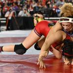Federal Way junior London Houston tries to turn Grangers Viktorya Torres during their 130-pound title bout. Houston prevailed by major decision 10-2 for her second state crown. RACHEL CIAMPI, Reporter