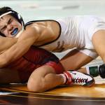 Decaturs 106-pound Collin Jack battles Sunnysides Elijah Barajas for the state title. Barajas won by 1-0 decision. RACHEL CIAMPI, Reporter