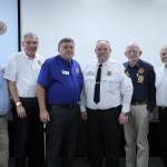 James Fossos, far right, stands with his fellow SKFR fire commissioners and fire chief Vic Pennington at a commissioners meeting on Feb. 26, 2019. Olivia Sullivan/staff photo