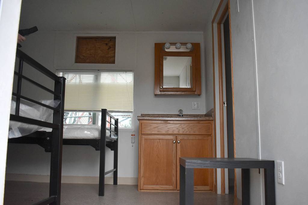 Photo by Haley Ausbun. A preview of the first modular unit being used to house King County residents under quarantine for COVID-19, coronavirus. The units will be located on a county-onward parcel in White Center, where an old office building is planned to be demolished to make space.