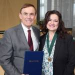 King County Councilmember Pete von Reichbauer presents Auburns Amy Hatcher with the Martin Luther King Medal of Distinguished Service during a ceremony Tuesday. Amy and her husband John were honored for their work in the community. COURTESY PHOTO